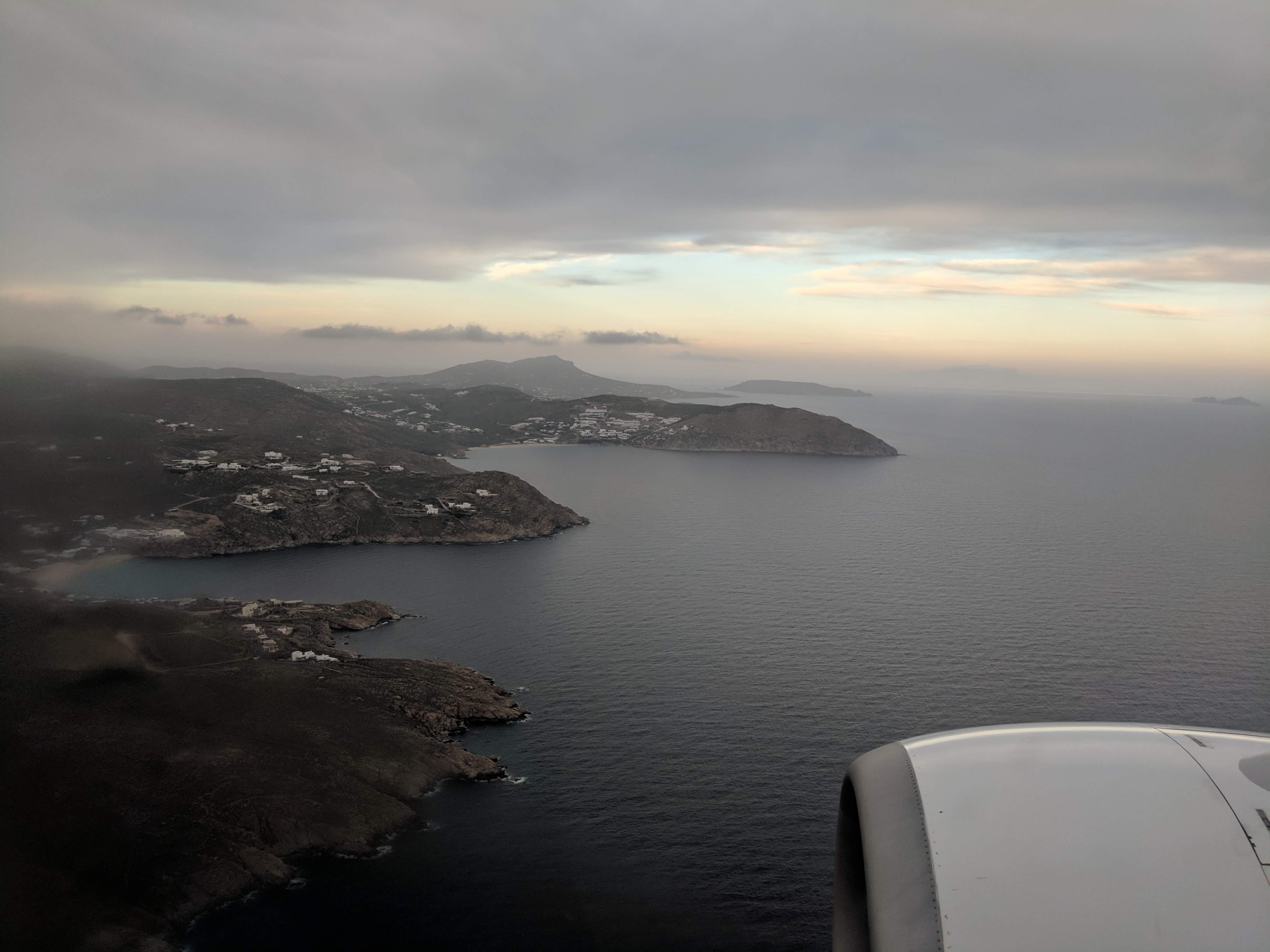 plane flying over islands